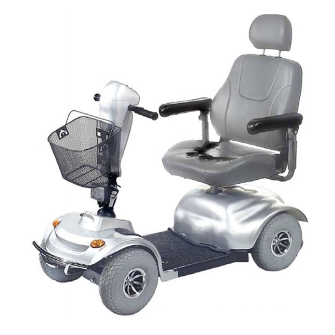 The Golden Tech Avenger HD Bariatric Mobility Scooter, in silver, boasts a high-backed seat with armrests and a front black wire basket. Designed for outdoor adventurers, it has four wheels and handlebars for smooth steering over rugged terrain.